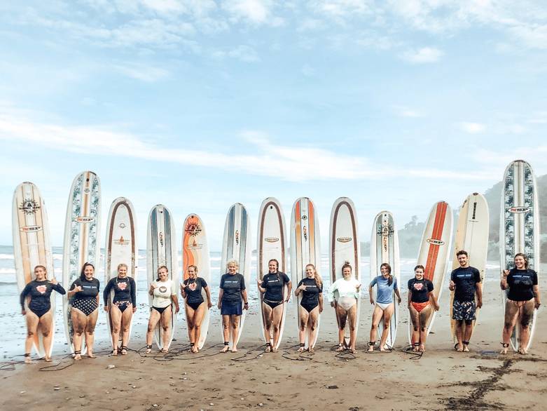 2019 GVSU HTM Costa Rica students learning to surf